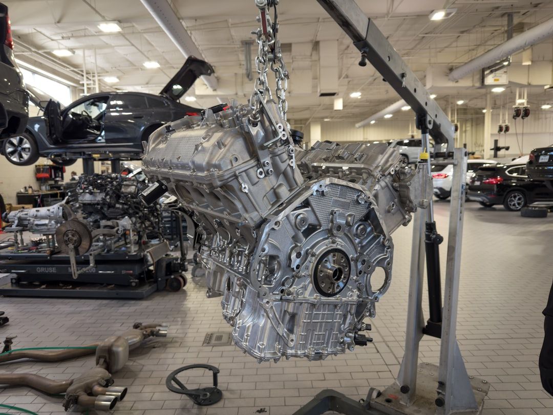 a car engine being worked on in a garage